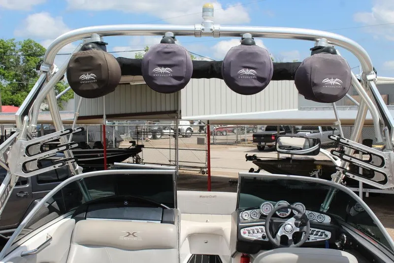 Slide: The Image of 2008 MasterCraft X45 boat interior with speakers and control panel. - 14