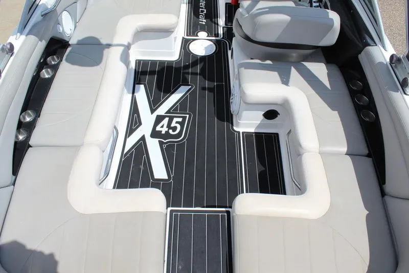 Slide: The Image of 2008 MasterCraft X45 boat interior with sleek seating and stylish design. - 15