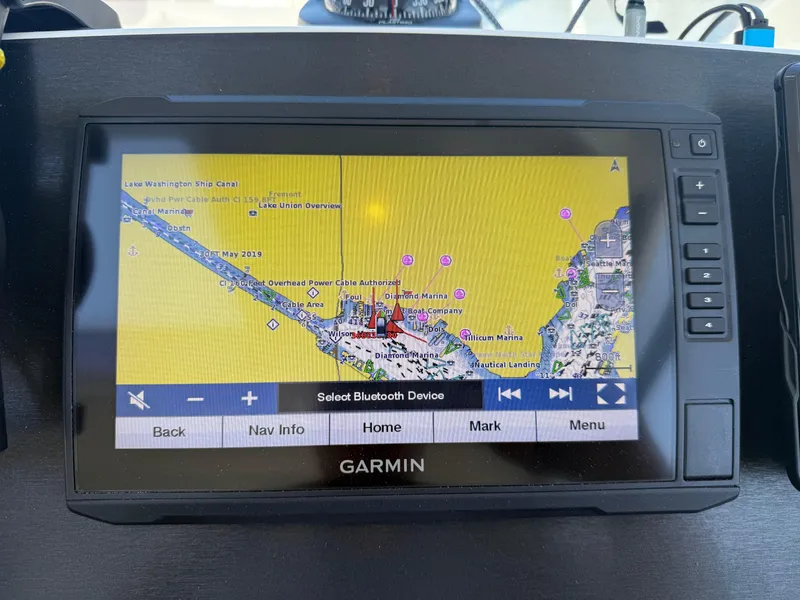 Slide: The Image of Garmin navigation display on 2021 Beneteau Antares 8, showing detailed marine map. - 7