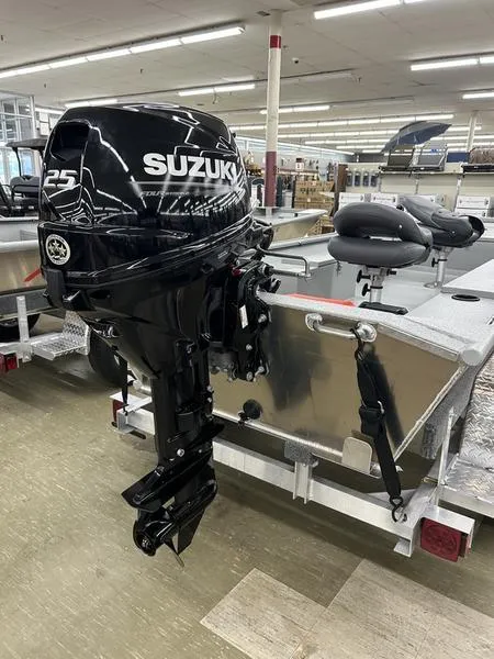 Slide: The Image of 2025 Xtreme River Skiff 1542SS with Suzuki 25 outboard motor in showroom. - 7