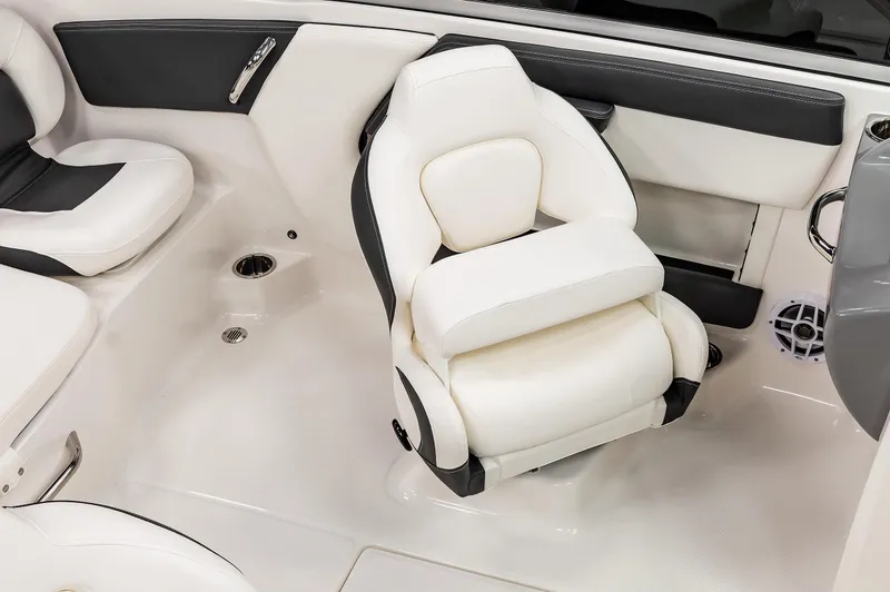 Slide: The Image of 2025 Chaparral OB Ski & Fish boat interior with white and black seating. - 18