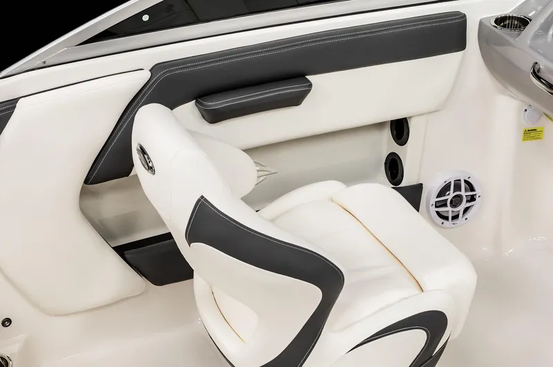 Slide: The Image of 2025 Chaparral OB Ski & Fish boat interior with white and black seating. - 22