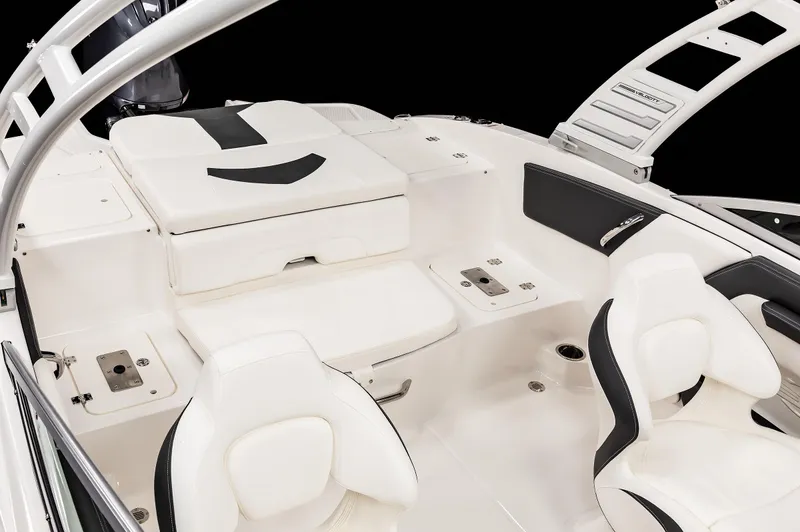 Slide: The Image of 2025 Chaparral OB Ski & Fish boat interior with white seating and sleek design. - 24