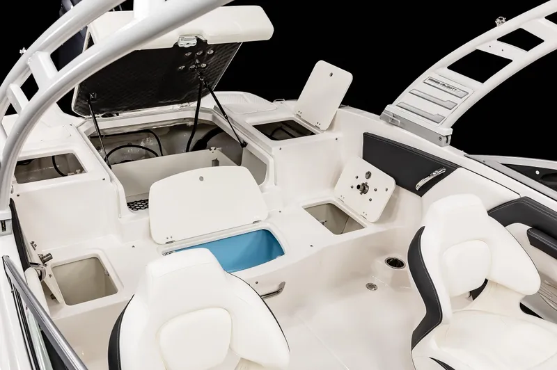 Slide: The Image of 2025 Chaparral OB Ski & Fish boat interior with seating and storage compartments. - 25