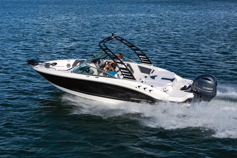 Slide: The Image of 2025 Chaparral OB Ski & Fish boat cruising on open water. - 3