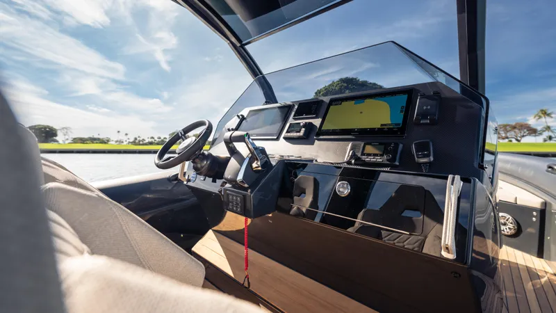 Slide: The Image of Modern Skipper-BSK 38 boat cockpit, 2025 model, featuring advanced navigation and control systems. - 11