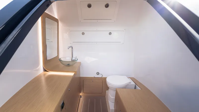 Slide: The Image of Modern Skipper-BSK 38 boat bathroom interior, featuring sleek design and wooden accents, 2025 model. - 24