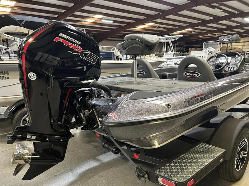 Slide: The Image of 2023 Triton 179 TrX boat with Mercury Pro XS engine in showroom. - 10