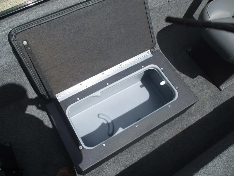 Slide: The Image of Open storage compartment in 2025 Tracker Panfish™ 17 boat interior. - 10