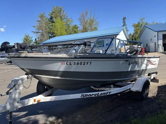 Slide: The Image of 2001 Lund 1700 Fisherman boat on ShoreLand'r trailer, parked outdoors. - 4