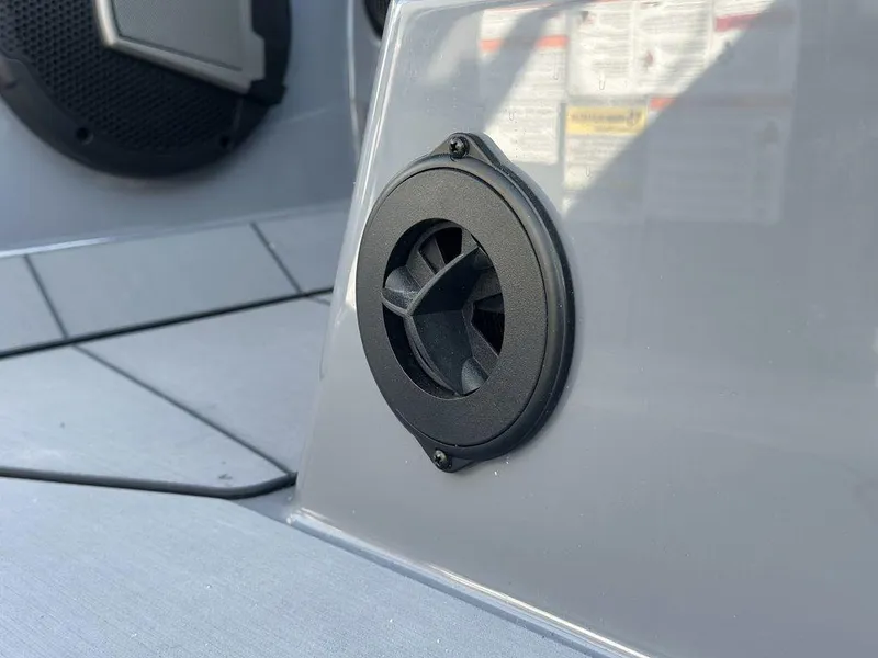 Slide: The Image of Close-up of a speaker on a 2025 Axis A225 boat interior. - 14