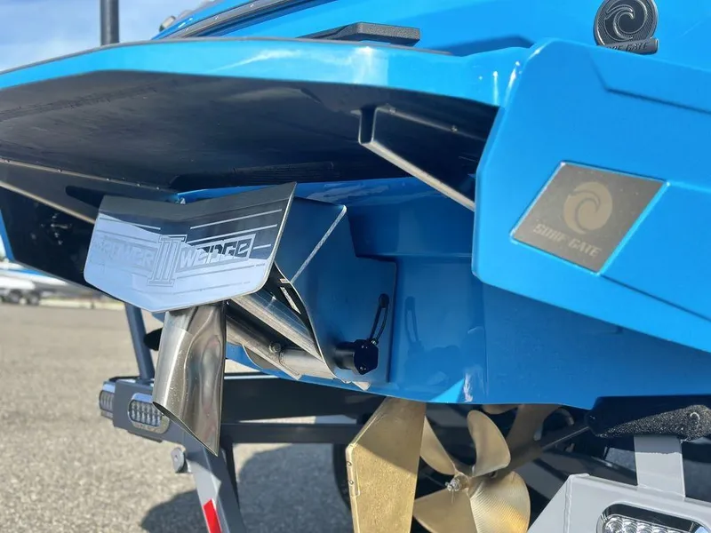 Slide: The Image of 2025 Axis A225 boat rear view with propeller and blue hull. - 5