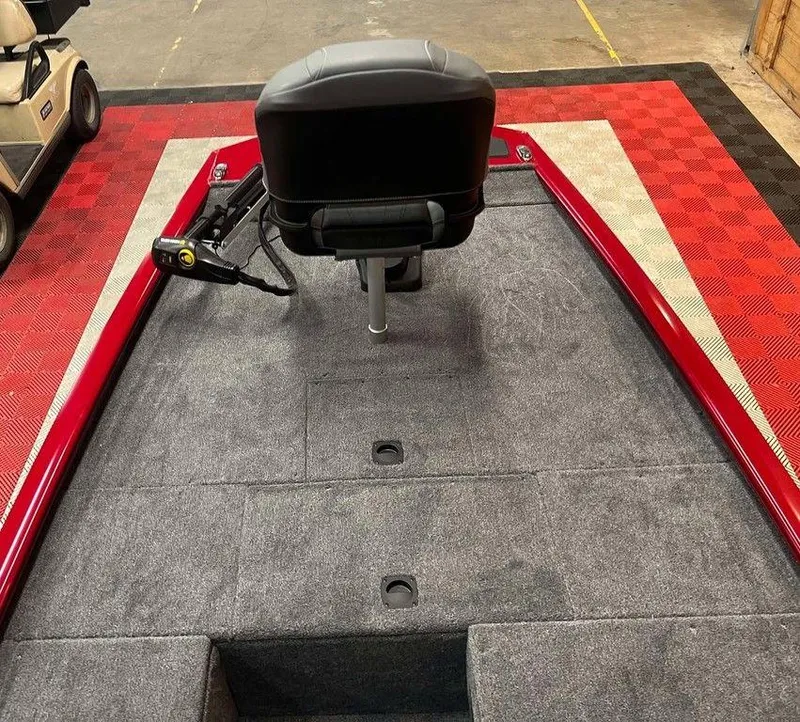 Slide: The Image of 2025 Tracker Pro 170 boat interior with red accents and seating. - 4