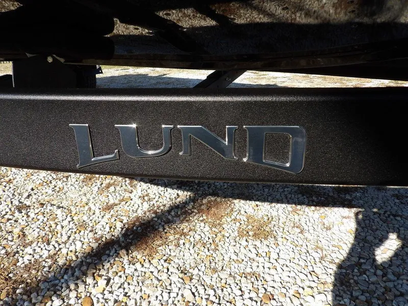 Slide: The Image of Close-up of Lund logo on 2025 Renegade SS boat trailer. - 10
