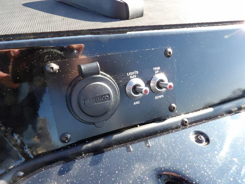 Slide: The Image of Control panel of 2025 Lund 1975 Renegade SS boat with switches and socket. - 14