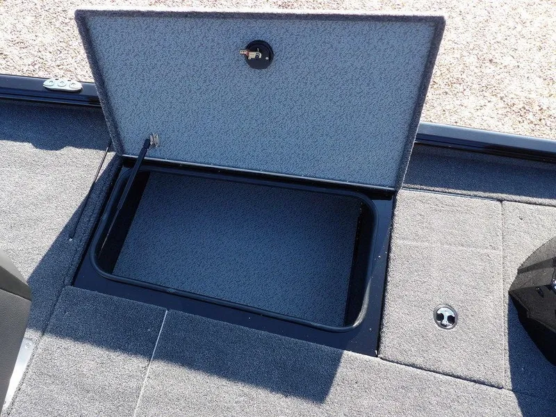Slide: The Image of Open storage compartment on 2025 Lund 1975 Renegade SS boat deck. - 18