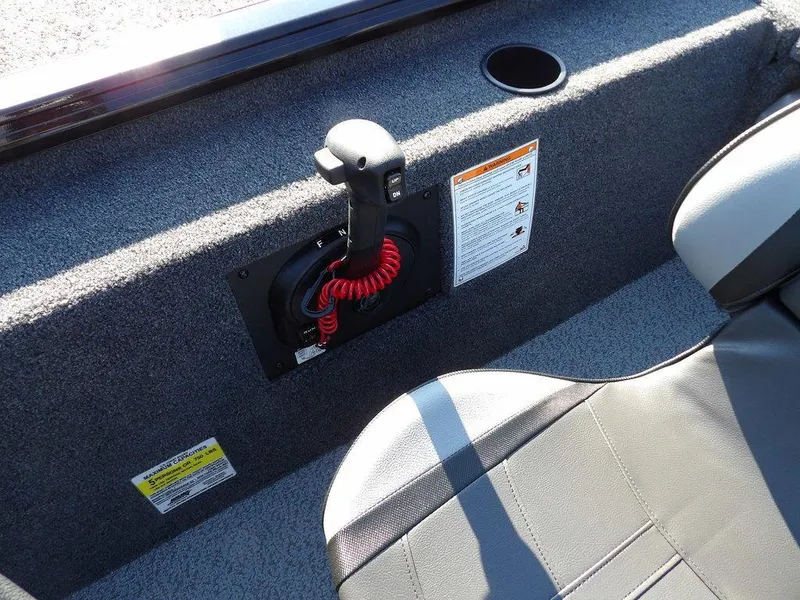 Slide: The Image of Interior of 2025 Lund 1975 Renegade SS boat with control panel and seating. - 26