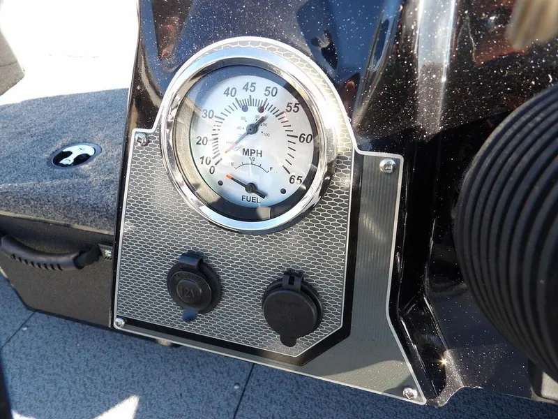 Slide: The Image of Dashboard of 2025 Lund 1975 Renegade SS boat with speedometer and fuel gauge. - 28