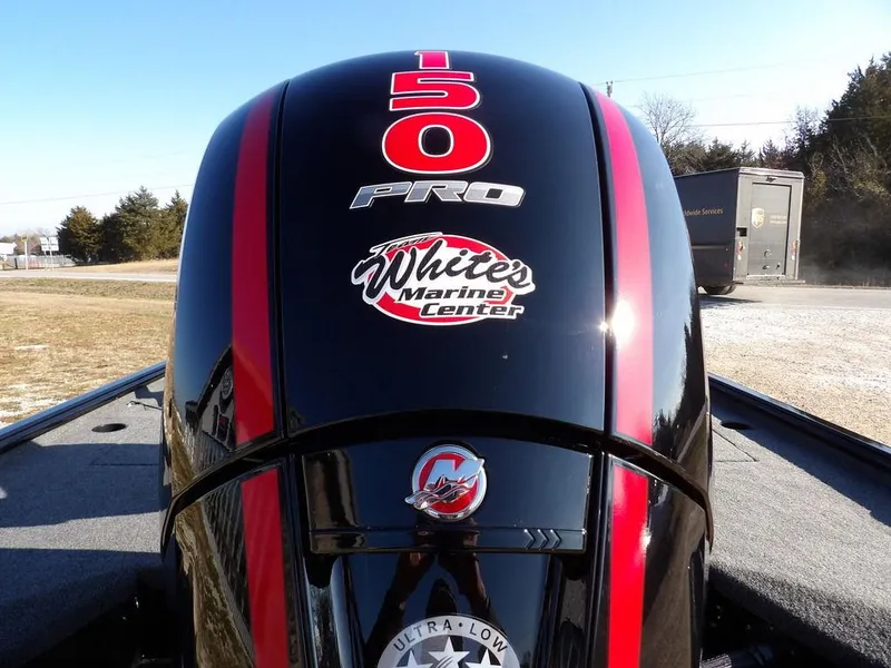 Slide: The Image of 2025 Lund 1975 Renegade SS boat engine with 150 Pro branding and White's Marine Center logo. - 3