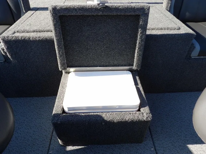 Slide: The Image of Open storage compartment in 2025 Lund 1975 Renegade SS boat interior. - 34