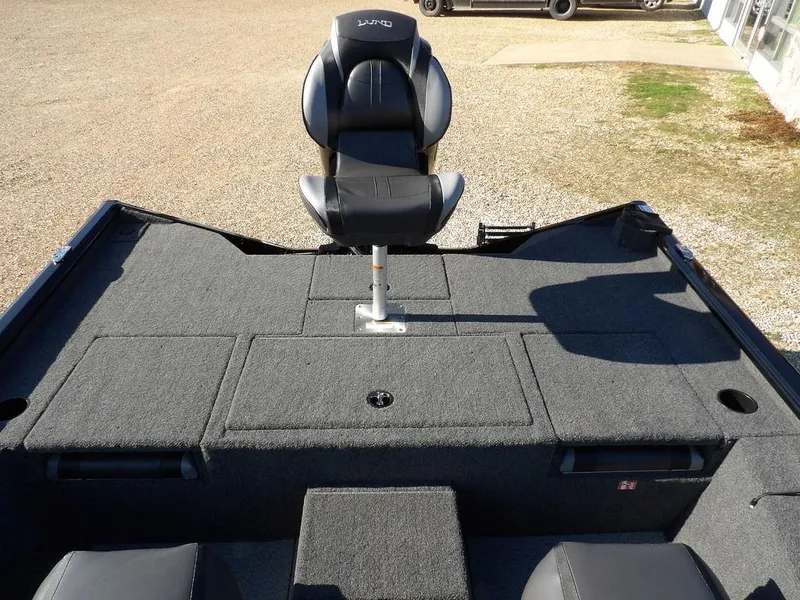 Slide: The Image of 2025 Lund 1975 Renegade SS boat interior with seating and storage compartments. - 39