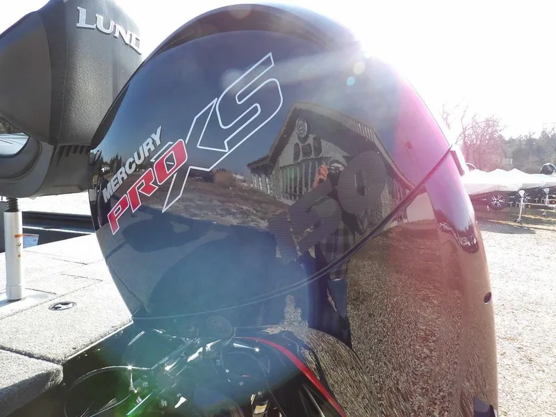 Slide: The Image of 2025 Lund 1975 Renegade SS with Mercury Pro XS engine in sunlight. - 4