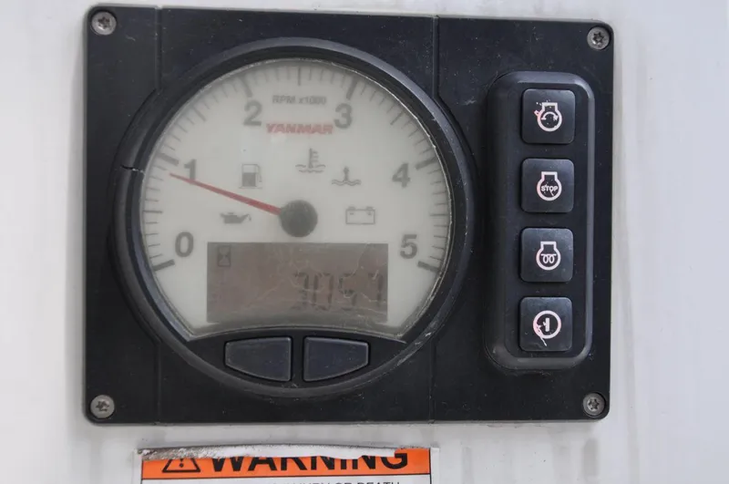 Slide: The Image of Control panel of a 2016 Jeanneau Sun Odyssey 349 sailboat with warning indicators. - 22