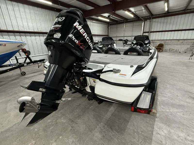 Slide: The Image of 2011 Nitro Z-7 boat with Mercury Pro XS engine in a garage. - 10