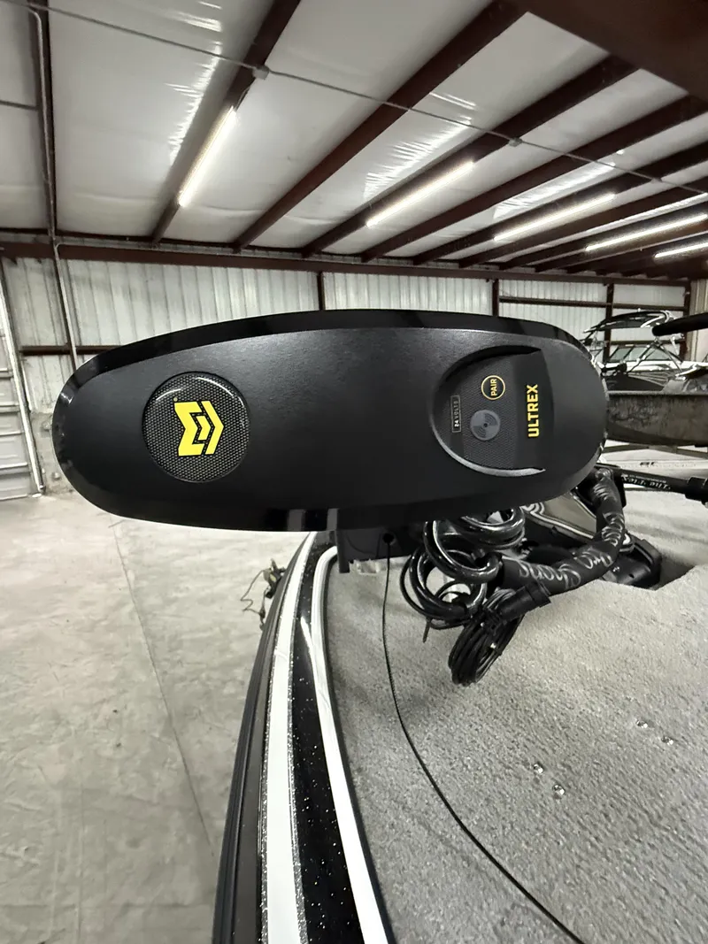 Slide: The Image of Trolling motor on 2011 Nitro Z-7 boat in a garage setting. - 12