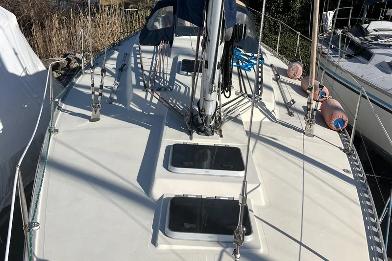 Slide: The Image of 1985 Contest 36S sailboat deck with rigging and hatches. - 17