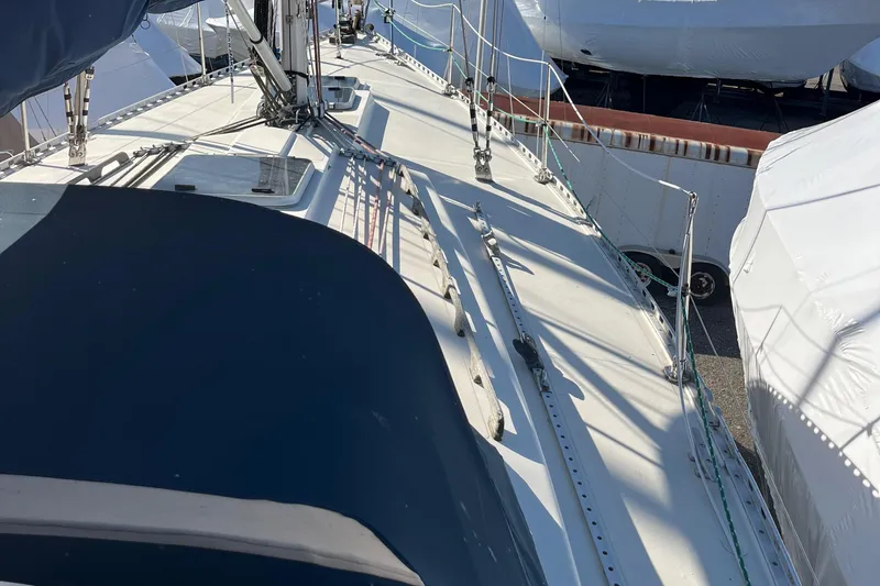 Slide: The Image of 1985 Contest 36S sailboat deck with rigging and covered cockpit. - 18