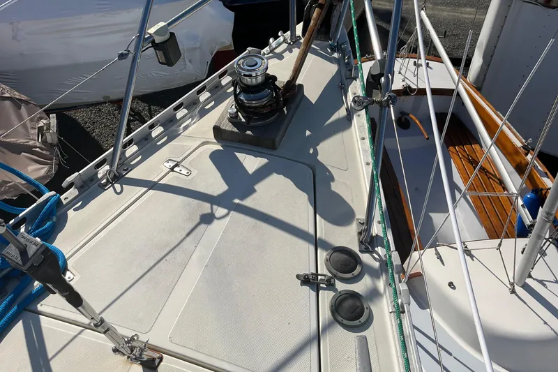 Slide: The Image of 1985 Contest 36S sailboat deck with winch and rigging details. - 21