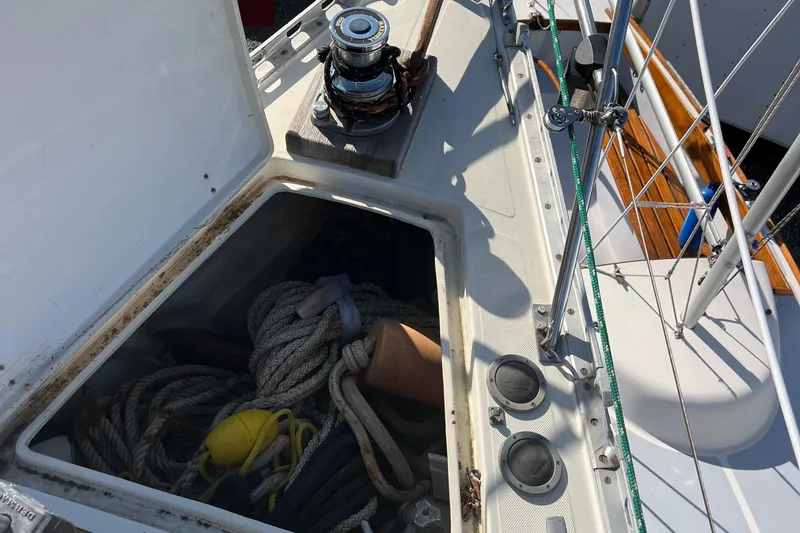 Slide: The Image of Open hatch on 1985 Contest 36S sailboat with ropes and winch visible. - 22