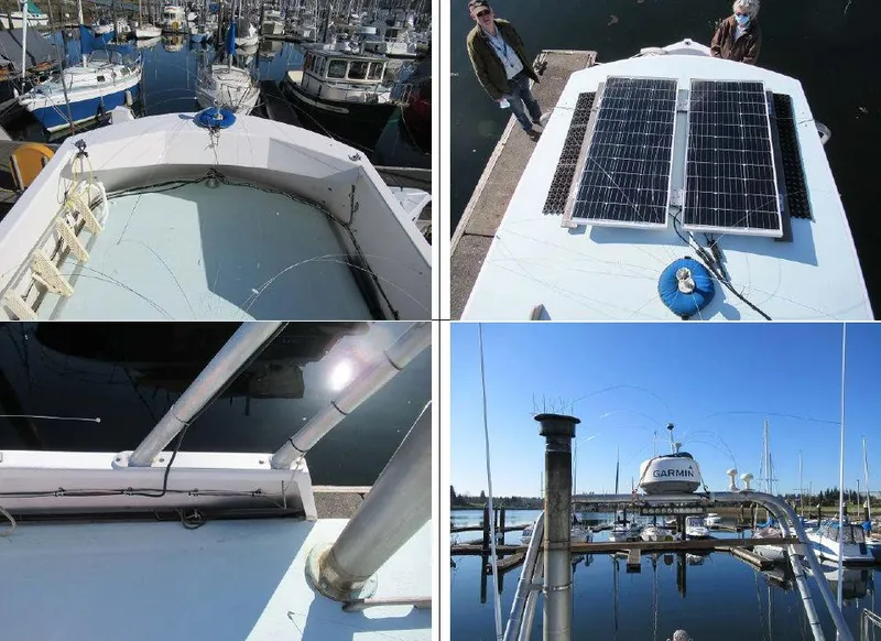 Slide: The Image of 1975 Monterey Diesel Cruiser Trawler with solar panels, docked in a marina. - 22