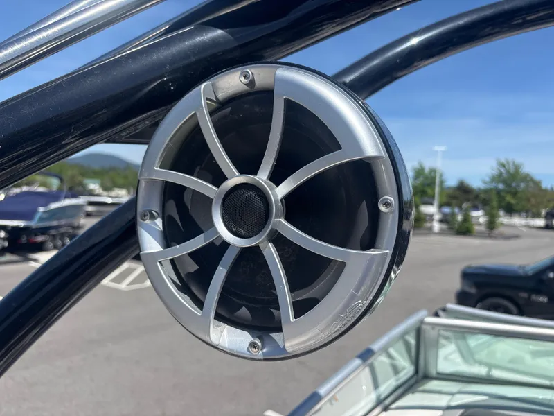 Slide: The Image of Close-up of a speaker on a 2017 Chaparral 264 Sunesta Surf boat. - 19