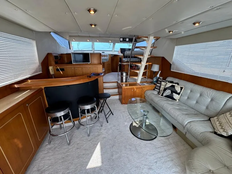 Slide: The Image of Luxurious interior of 1989 Birchwood 62 Cockpit Motor Yacht with modern furnishings. - 22