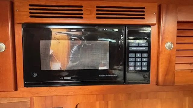 Slide: The Image of Built-in microwave in 2003 J Boats J/46 yacht kitchen. - 32