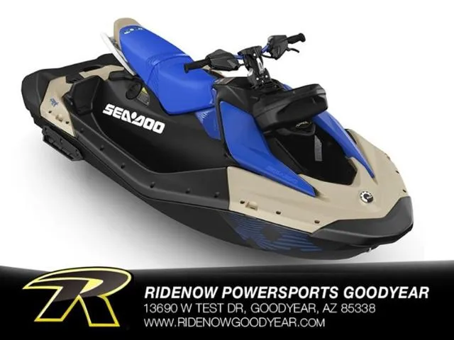Slide: The Image of 2025 Sea-Doo Spark Trixx Waverunner, blue and beige, at RideNow Powersports Goodyear. - 1