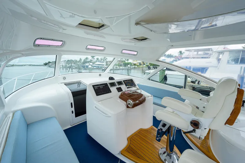Slide: The Image of Interior of 2013 Viking 42 Open yacht with modern helm and seating. - 10
