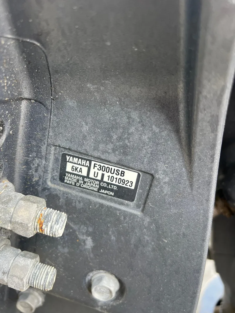 Slide: The Image of Close-up of Yamaha F300USB engine label on 2023 Cobia 237 Center Console boat. - 6