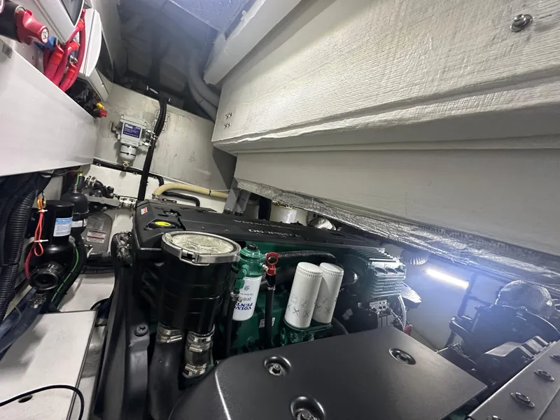 Slide: The Image of Engine room of 2021 Galeon 425 HTS yacht, showcasing mechanical components and wiring. - 30