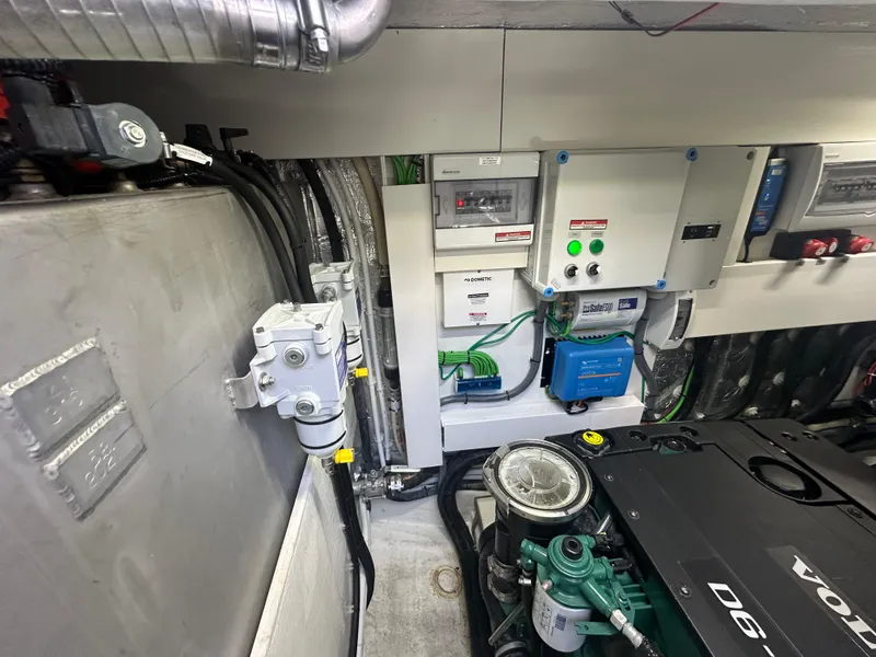 Slide: The Image of Engine room of 2021 Galeon 425 HTS yacht, featuring Volvo Penta components and electrical systems. - 32