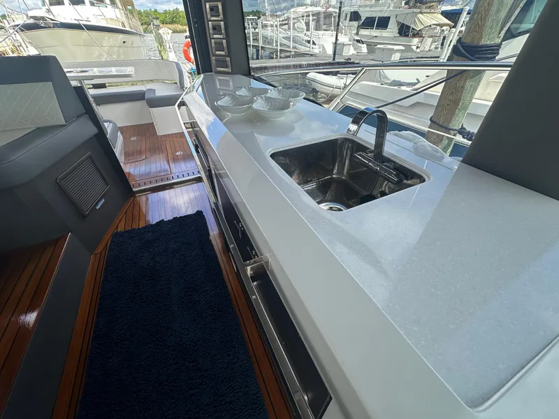 Slide: The Image of Modern kitchen area on 2021 Galeon 425 HTS yacht with sleek countertop and sink. - 36