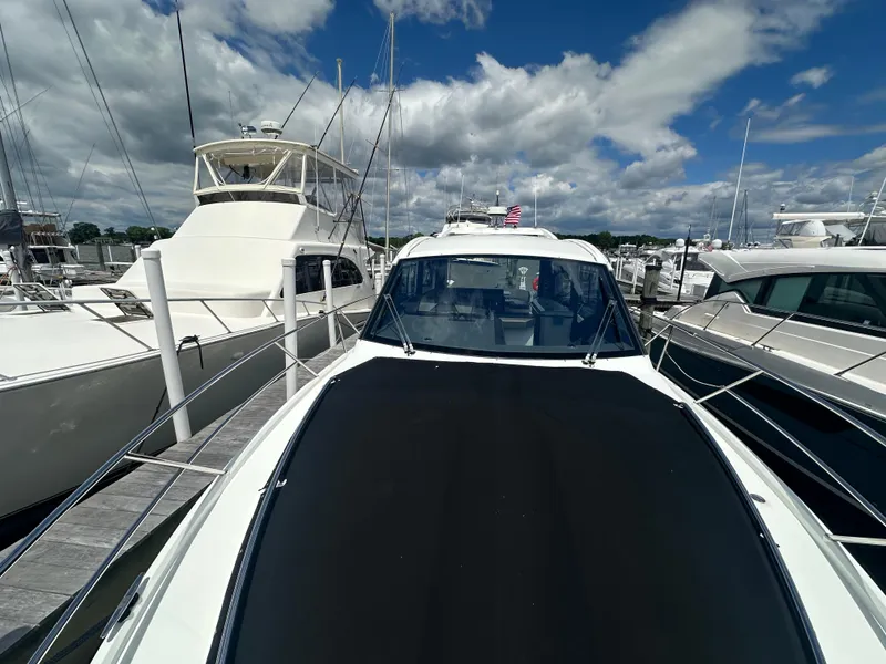 Slide: The Image of 2021 Galeon 425 HTS yacht docked at marina under blue sky. - 46