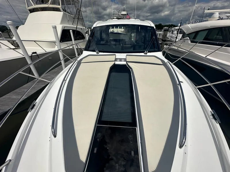 Slide: The Image of 2021 Galeon 425 HTS yacht docked, showcasing sleek design and modern features. - 48