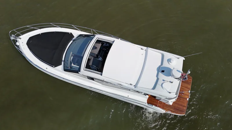 Slide: The Image of Aerial view of 2021 Galeon 425 HTS yacht cruising on water. - 8