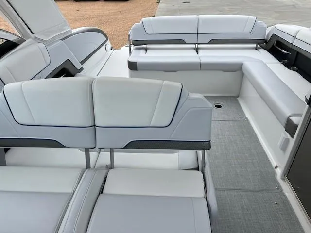 Slide: The Image of 2025 Formula 330 Crossover Bowrider I/O interior with spacious seating and modern design. - 10