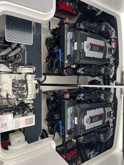 Slide: The Image of 2025 Formula 330 Crossover Bowrider I/O engine compartment with dual 6.2L engines. - 11