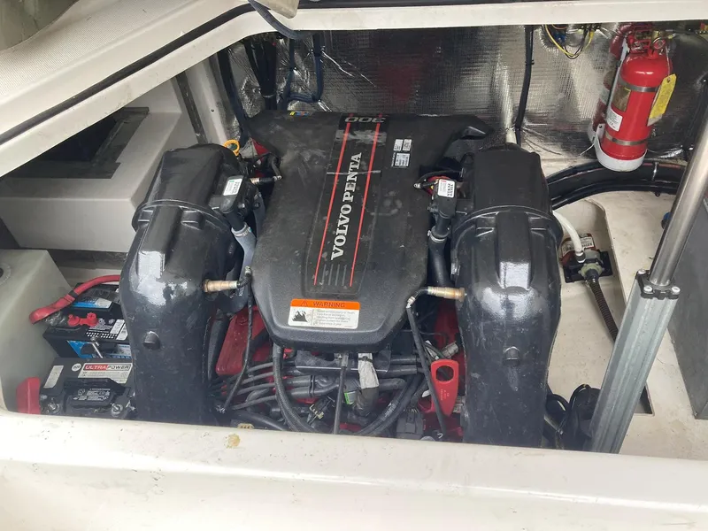 Slide: The Image of Engine compartment of a 2015 Regal 28 Express with Volvo Penta engine. - 16