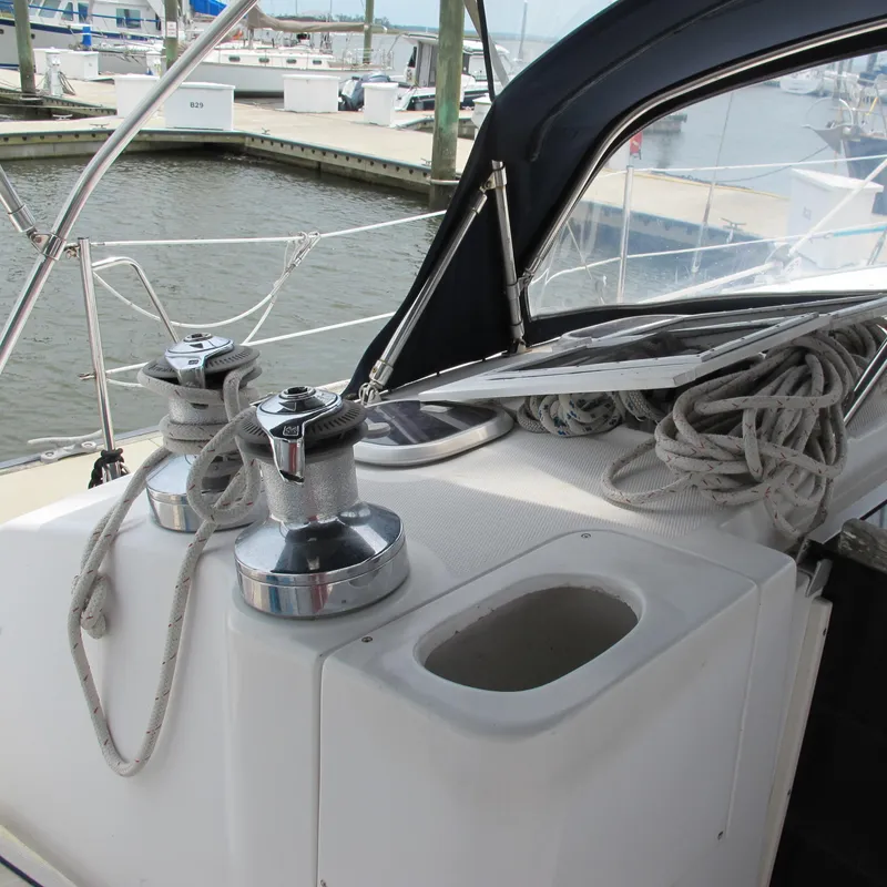 Slide: The Image of Sailboat deck with winches and ropes, Hunter 410, 1998 model, docked at marina. - 10